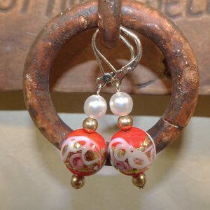 Handmade drop-style Murano earrings in Mediterranean orange with lampwork